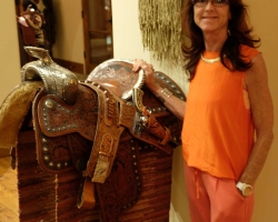 Kathy Baker with a parade saddle