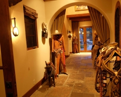 The hallway featured lifesized costumes and saddles along with miniature salesman's saddle samples