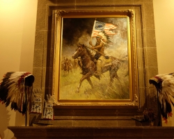 Painting by Z. S. Liang surrounded by two Indian American Eagle Headdress